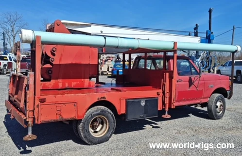 Pump Hoist Rig Mounted on a 1990 Ford Truck for Sale